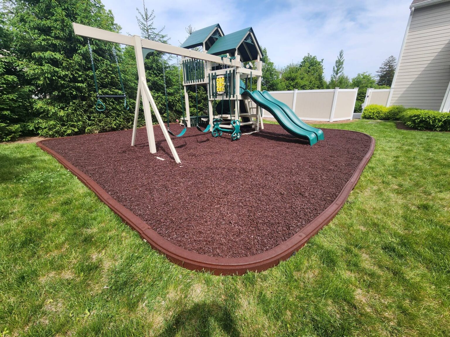 The Pros and Cons of Rubber Mulch Swingset & Toy Warehouse