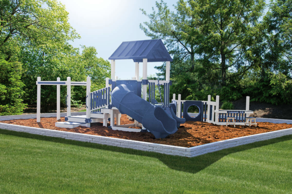 a commercial playset in a park for an organization