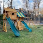 Custom designed space-saving playhouse and swingsets